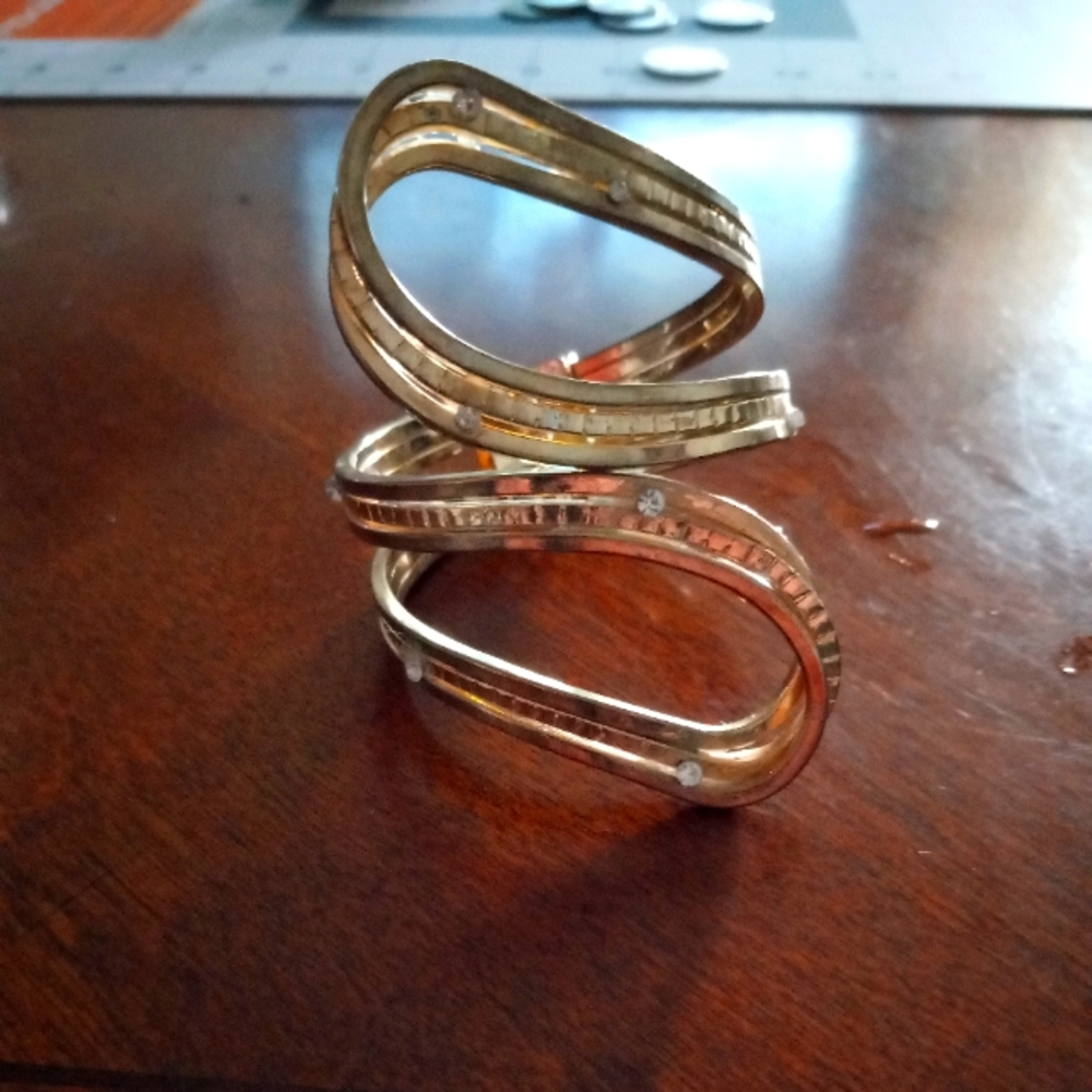 Gold bracelet with rhinestones